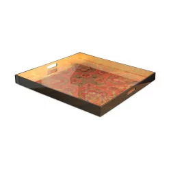 A lacquered serving tray with oriental motifs