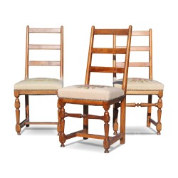 A set of three walnut seats covered with gobelin