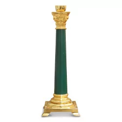 A green column lamp with Corinthian capital.