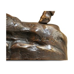 Une sculpture en bronze signé GM Dubucand