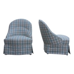 A pair of seats covered in checkered fabric