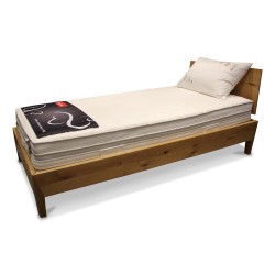 A \"Roviva\" bed frame in knotty oak