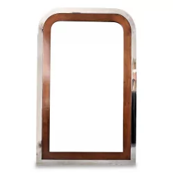 A “Design” mirror with wooden and stainless steel frame