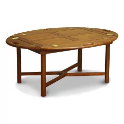 A “Bateau” coffee table in walnut-tinted rubberwood