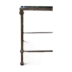 A pair of bronze end tables, glass top