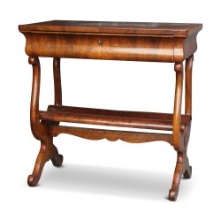 A side table in burl walnut, embossed wood