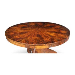 A burl walnut dining room table