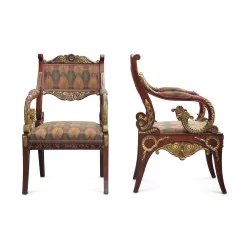 A pair of mahogany and gilded wood seats