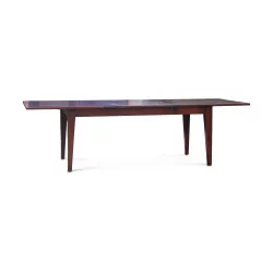 An oak dining room table with extension. French artisanal work