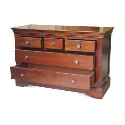 A richly molded walnut storage unit, five drawers