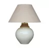 A light yellow porcelain light fixture with yellow shade. - Moinat - Table lamps