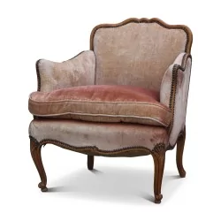 Bergère chair covered in pale pink velvet. Around 1930.