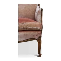 Bergère chair covered in pale pink velvet. Around 1930.