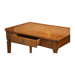 A side table in cherry wood, richly inlaid latticework veneer