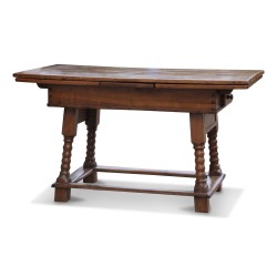 A dining room table in oak, walnut and cherry