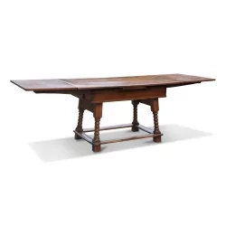 A dining room table in oak, walnut and cherry