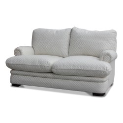 A beige sofa with silver diamond print.