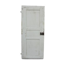 An oak passage door painted white