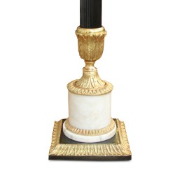 A pair of marble base lighting decorated with bronze