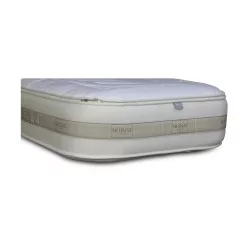 Un matelas Edelweiss Tonic Hors standard avec deux coins ronds sur chaque matelas