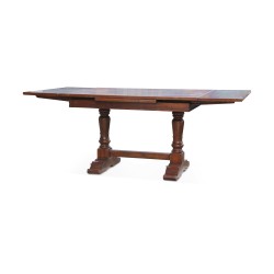A Louis XIII walnut table with two extensions. Swiss