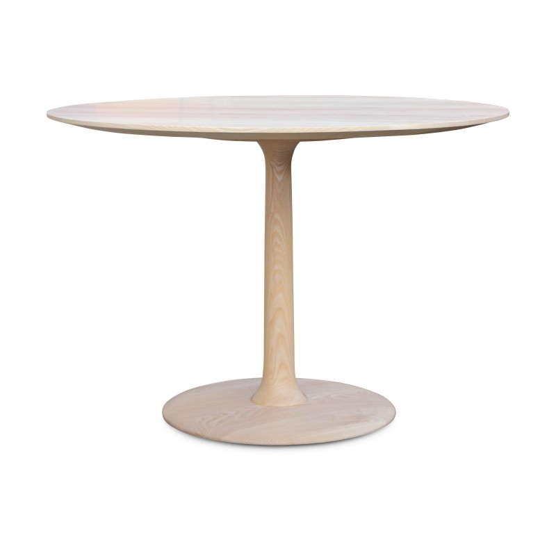 Une table ronde en bois de frêne - Moinat - Tables de salle à manger