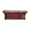 Un canapé "Chesterfield" en cuir, patine marron. Restauré - Moinat - Canapés