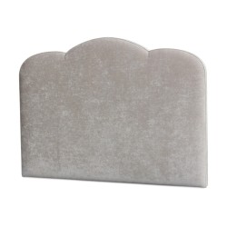 A “Nuage” headboard covered in gray “Sherborne” fabric
