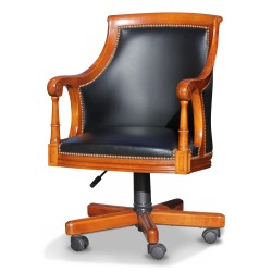 A beech executive office chair, upholstered in black leather, rotating base