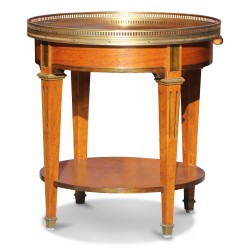 A Louis XVI bedside table in cherry wood, \"Richelieu\" model decorated with bronze