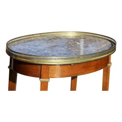 A hot water bottle table in cherry wood, rock marble top and pull