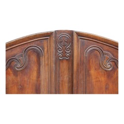 A pair of richly molded “Provençal” walnut doors, engraved “BC 1880”