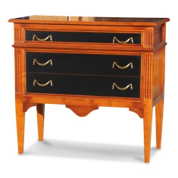 A Louis XVI directorate chest of drawers in cherry wood