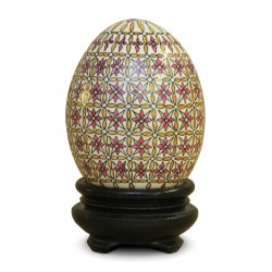 A Russian wooden egg with geometric decoration \"Red flower on beige background\"