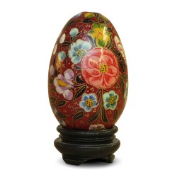 A Russian wooden egg with floral decoration