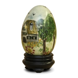 A porcelain egg with “Village” decor. Holland