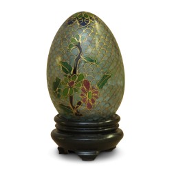A jade stone egg with Chinese decoration