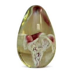 A glass egg with floral decoration