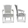 A pair of Louis XVI armchairs in painted wood, conventional upholstery, covered in fabric - Moinat - Armchairs