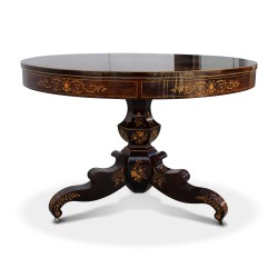 An inlaid walnut dining room table