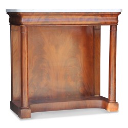 A mahogany columned server. White marble top. France. Around 1840.