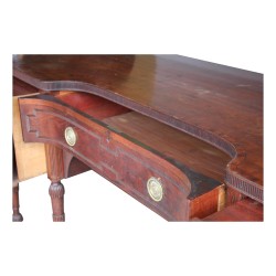 A Regency mahogany \"Side Board\" sideboard mounted on oak