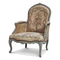 A beech armchair covered in “Gobelin” fabric, gray patina wood