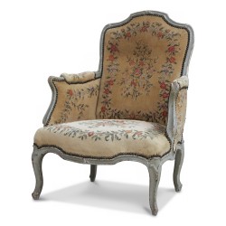 A beech armchair covered in “Gobelin” fabric, gray patina wood
