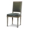 A Louis XVI chair, square back covered in green fabric. Model - Moinat - Chairs