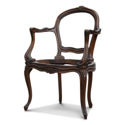 Un fauteuil de bureau Louis XV. Modèle