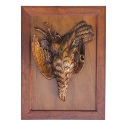 A carved walnut \"Brienz\" \"hanging bird\"