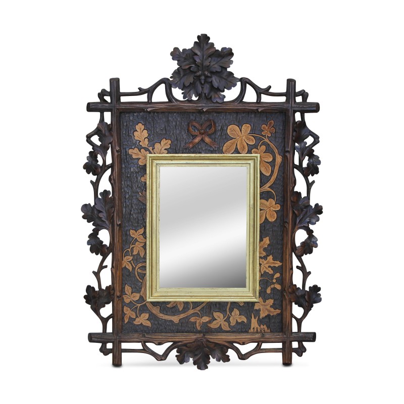 Ein Spiegel montiert auf einer reich geschnitzten „Brienz“-Tafel - Moinat - Brienz