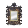 Ein Spiegel montiert auf einer reich geschnitzten „Brienz“-Tafel - Moinat - Brienz