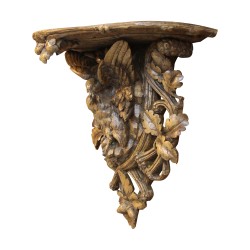 Un mobilier "Brienz", bois sculpté à motif d’un oiseau aux ailes déployées